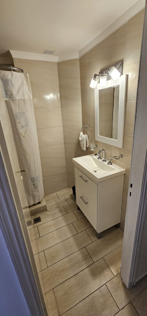 Private bathroom with shower in a room at Hotel Soleares